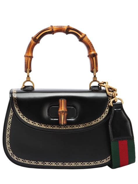 gucci bag with bamboo handle.